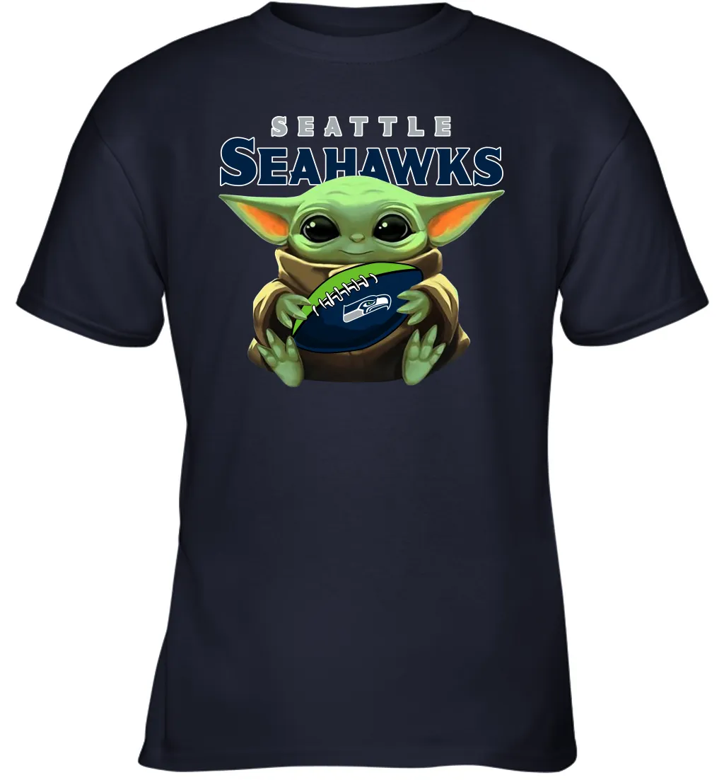 Baby Yoda Loves The Seattle Seahawks Star Wars Baby Yoda Hugs Seahawks NFL Youth T-Shirt